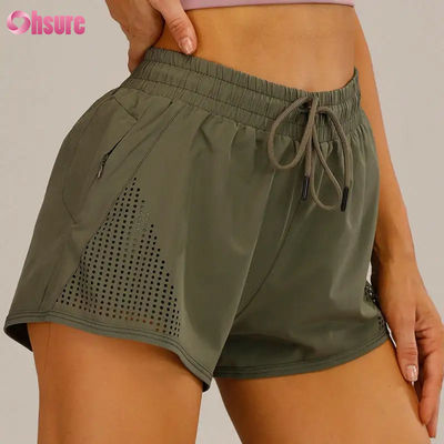 女性用スポーツトレーニングショートパンツ 激光切断 呼吸 ウォーミングアップ ザッパー サイドポケット 固体パターン