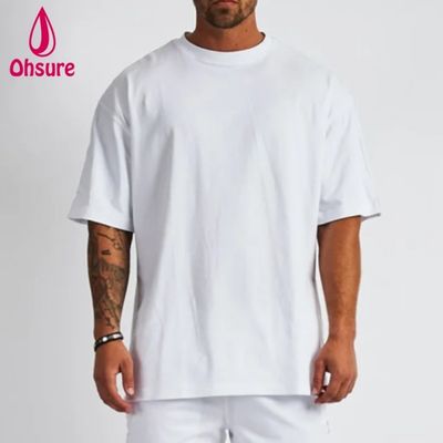 無地のコットンストリートウェアTシャツ オーバーサイズ ドロップショルダーTシャツ ヘビーウェイトTシャツ メンズカジュアル用カスタム高品質プリント
